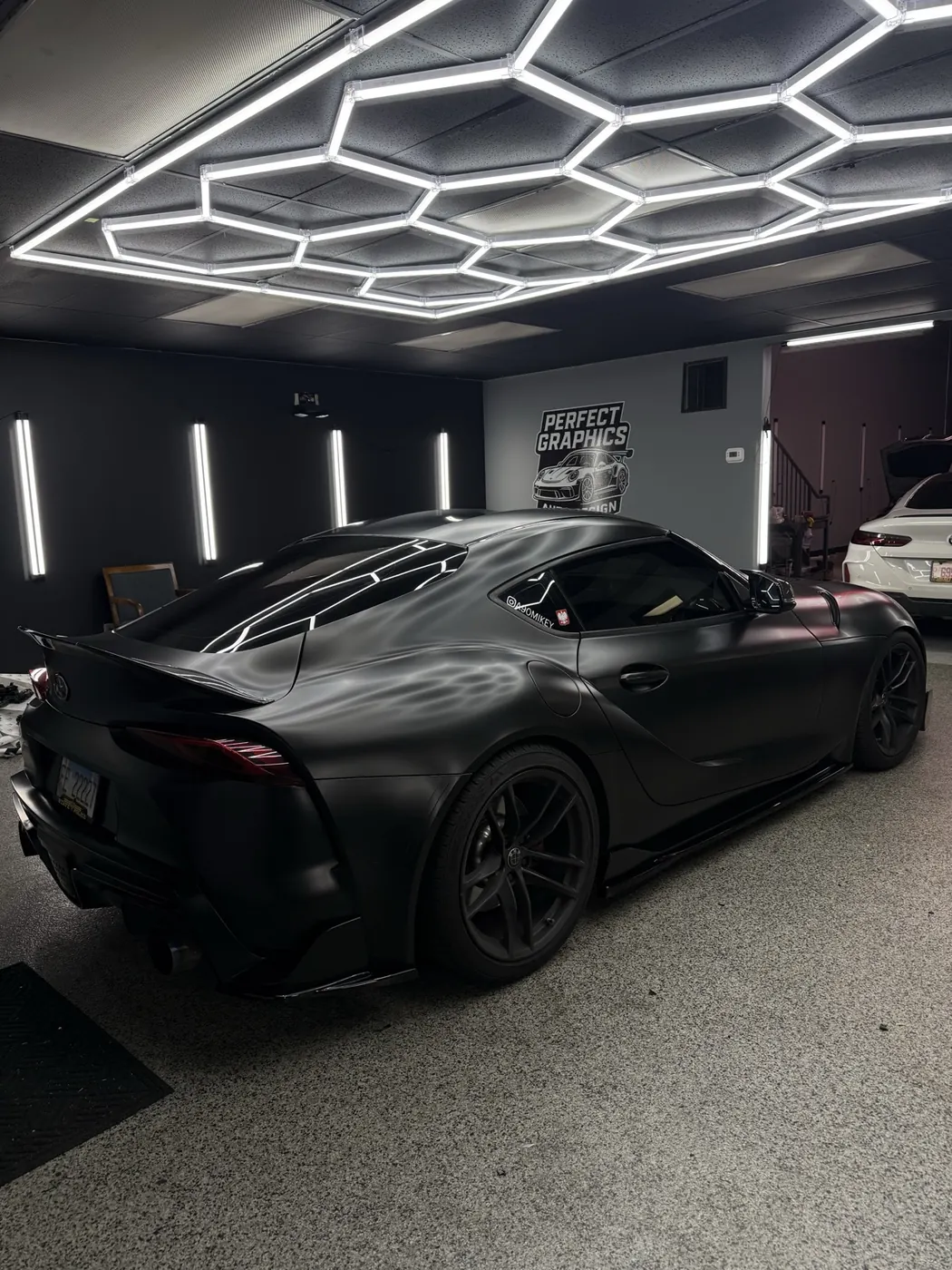 Satin black Toyota Supra with a full chrome delete by Perfect Graphics in Cary, IL