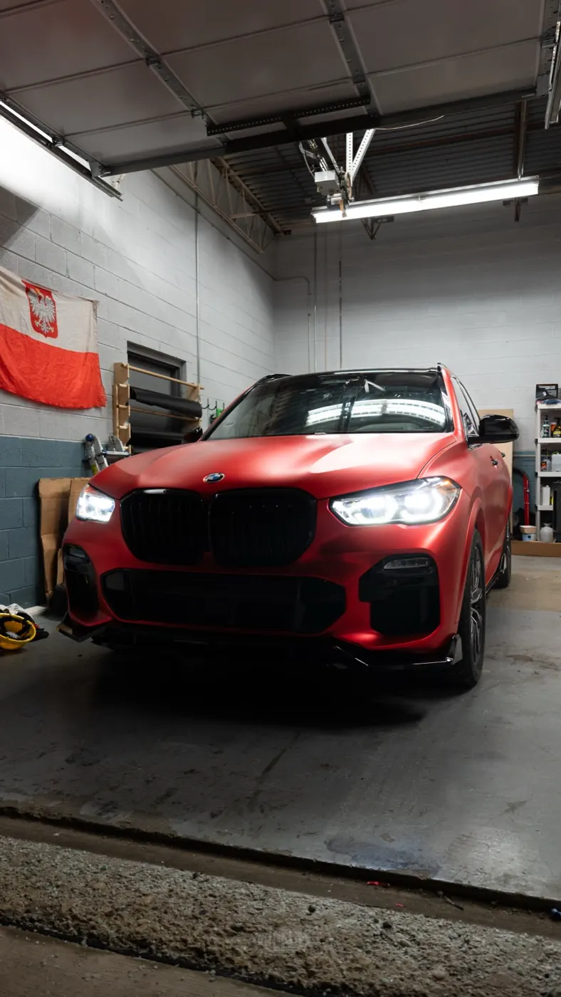 Red X5 wrap on Instagram