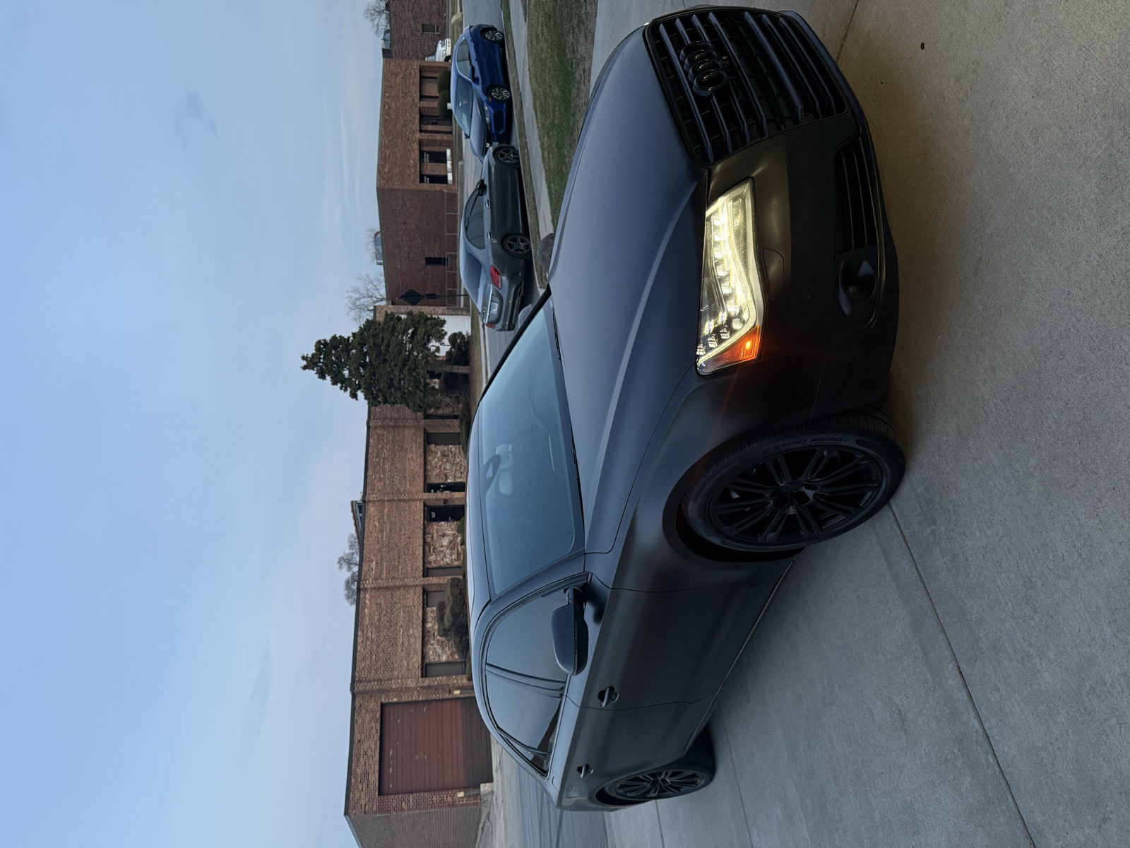 Audi A8 satin black wrap — front