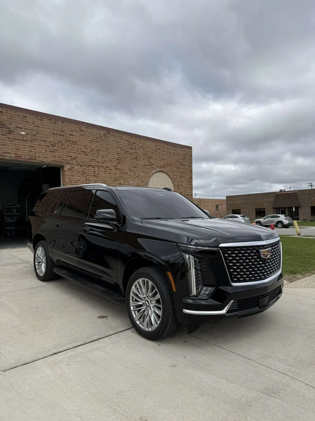 Cadillac Escalade gloss black wrap, front