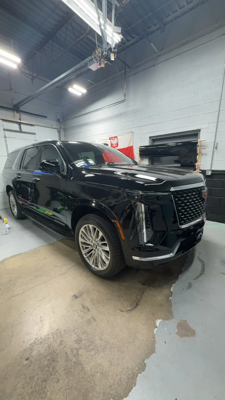 Cadillac Escalade gloss black, indoor shop
