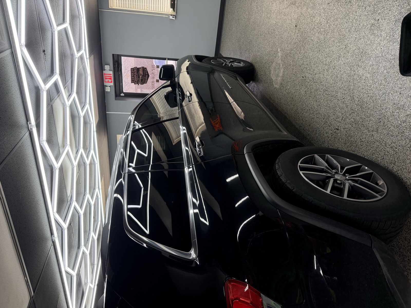 Porsche Cayenne gloss black — rear overhead