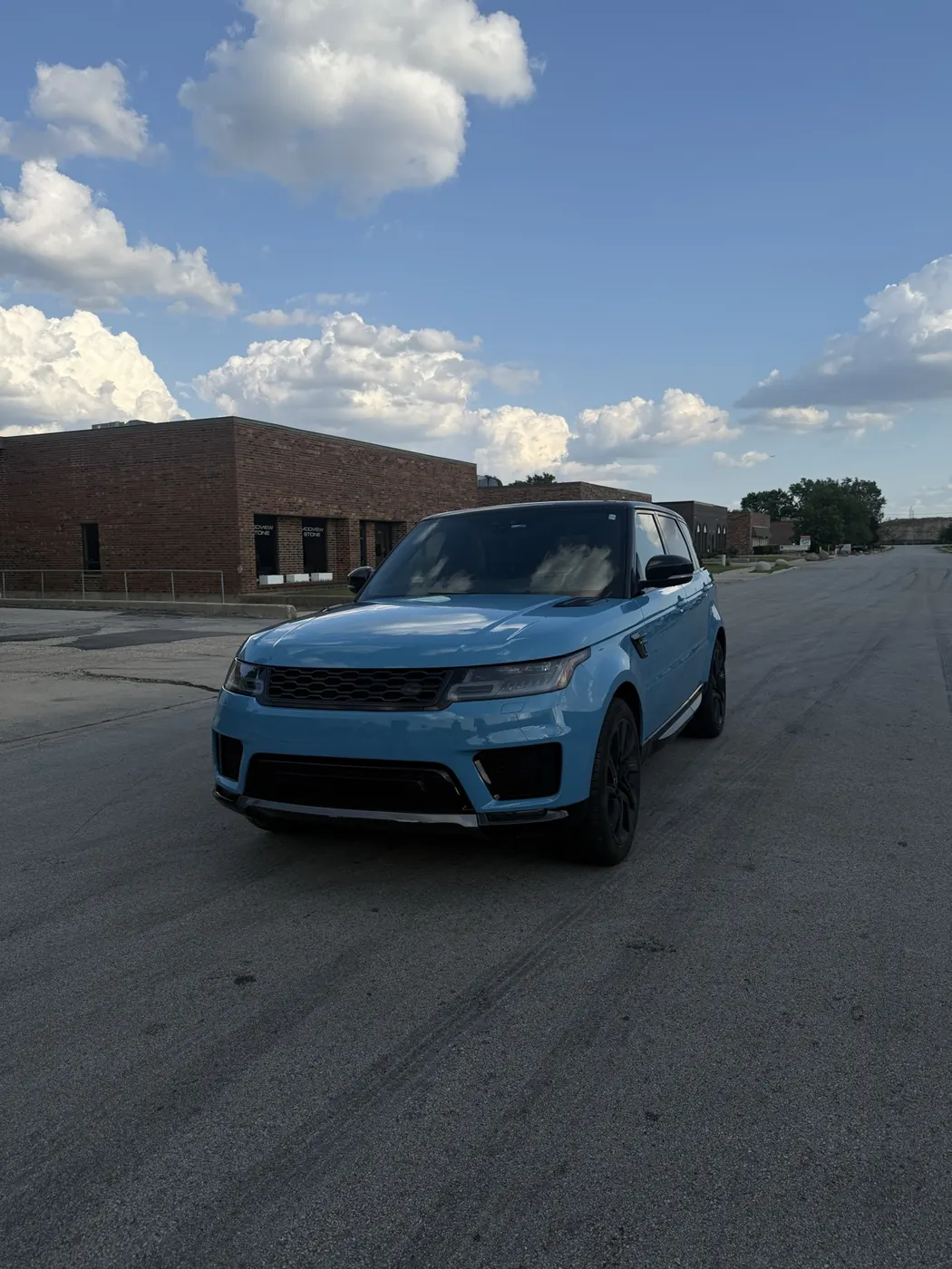 Range Rover Sport baby blue wrap, front three-quarter