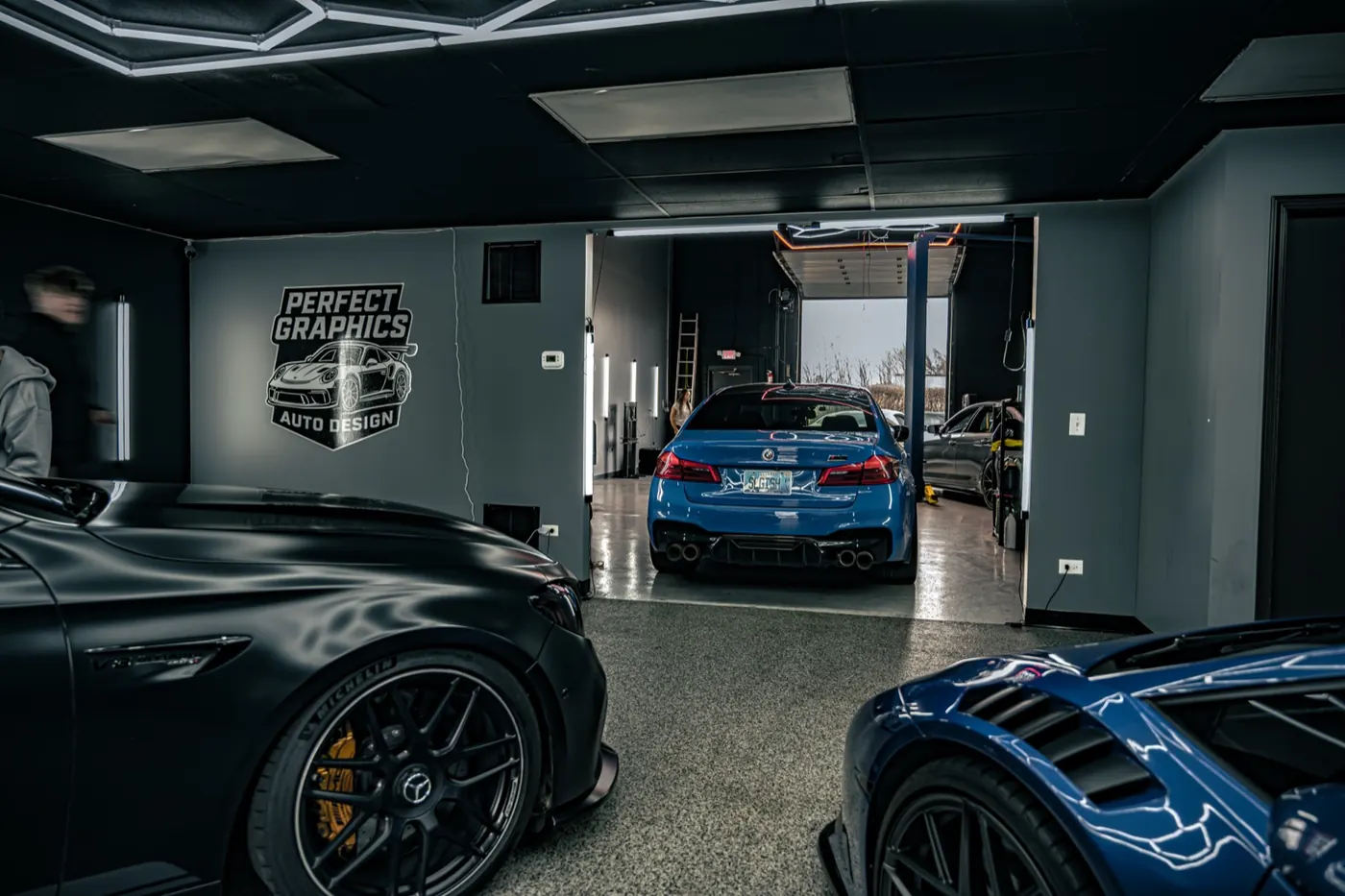 Perfect Graphics Auto Design shop interior with multiple cars