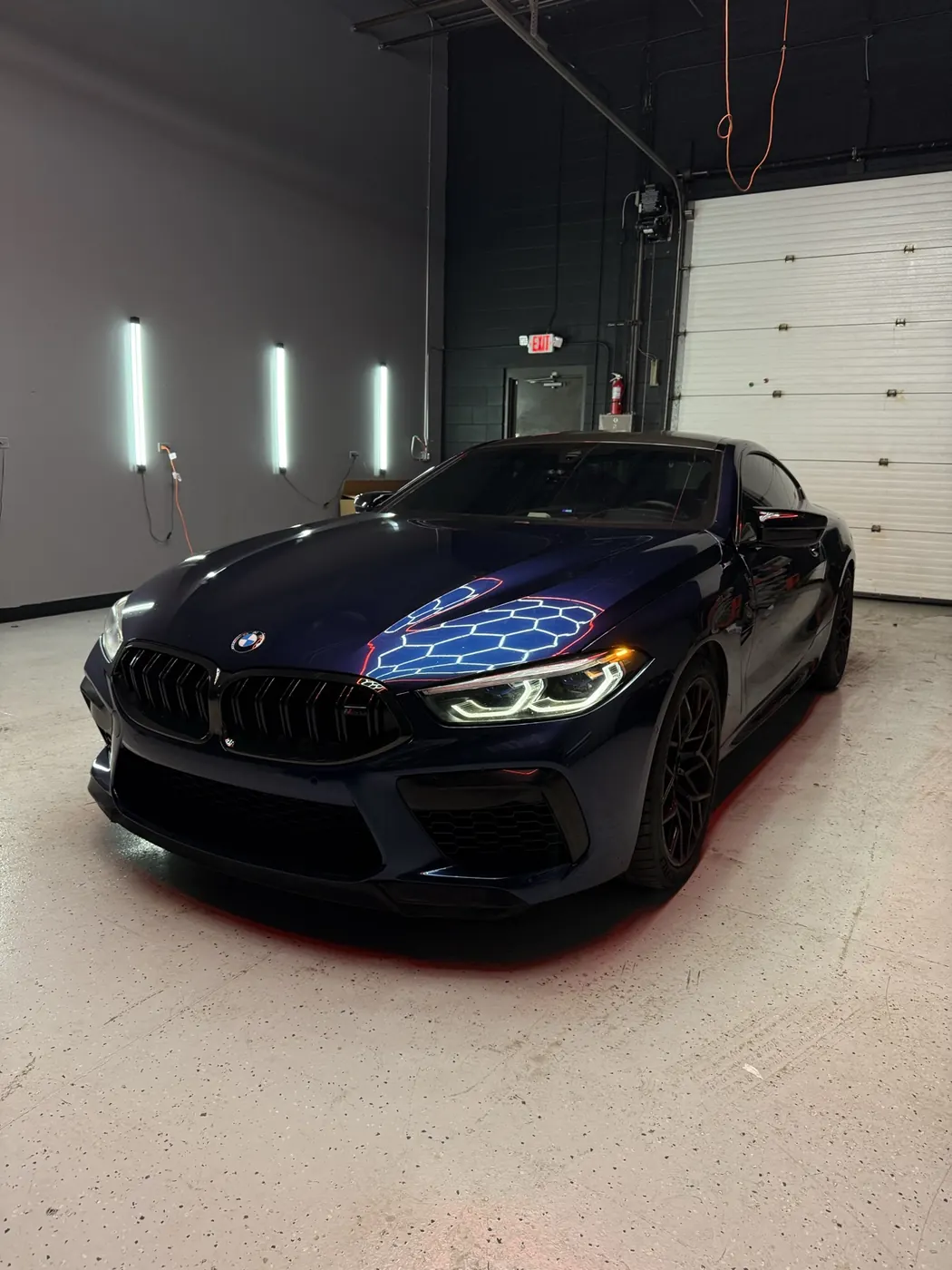 Blue BMW M8 Competition protected with paint protection film