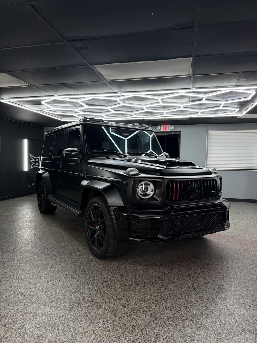 Mercedes-AMG G-Class wrapped in matte black, inside the Perfect Graphics shop