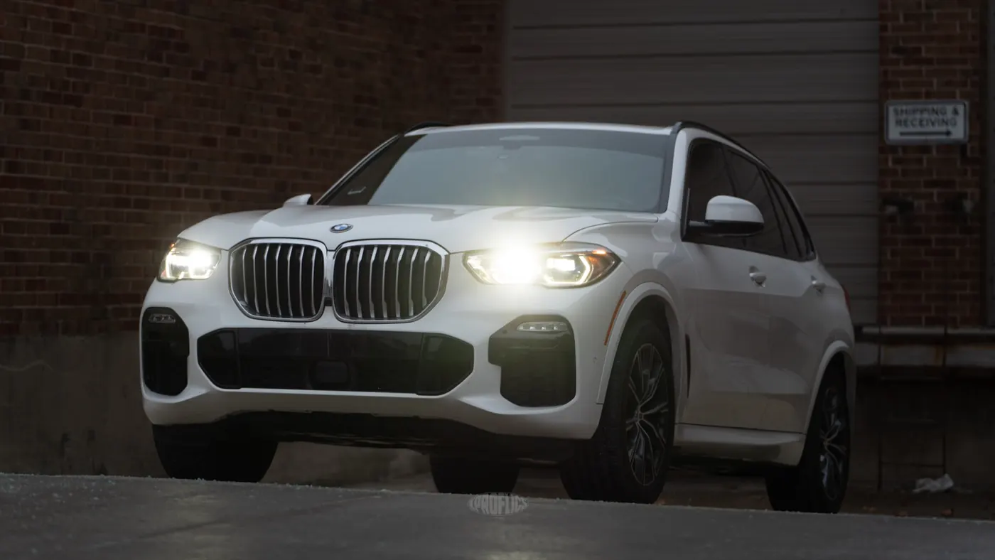 White BMW X5 with tinted front side windows